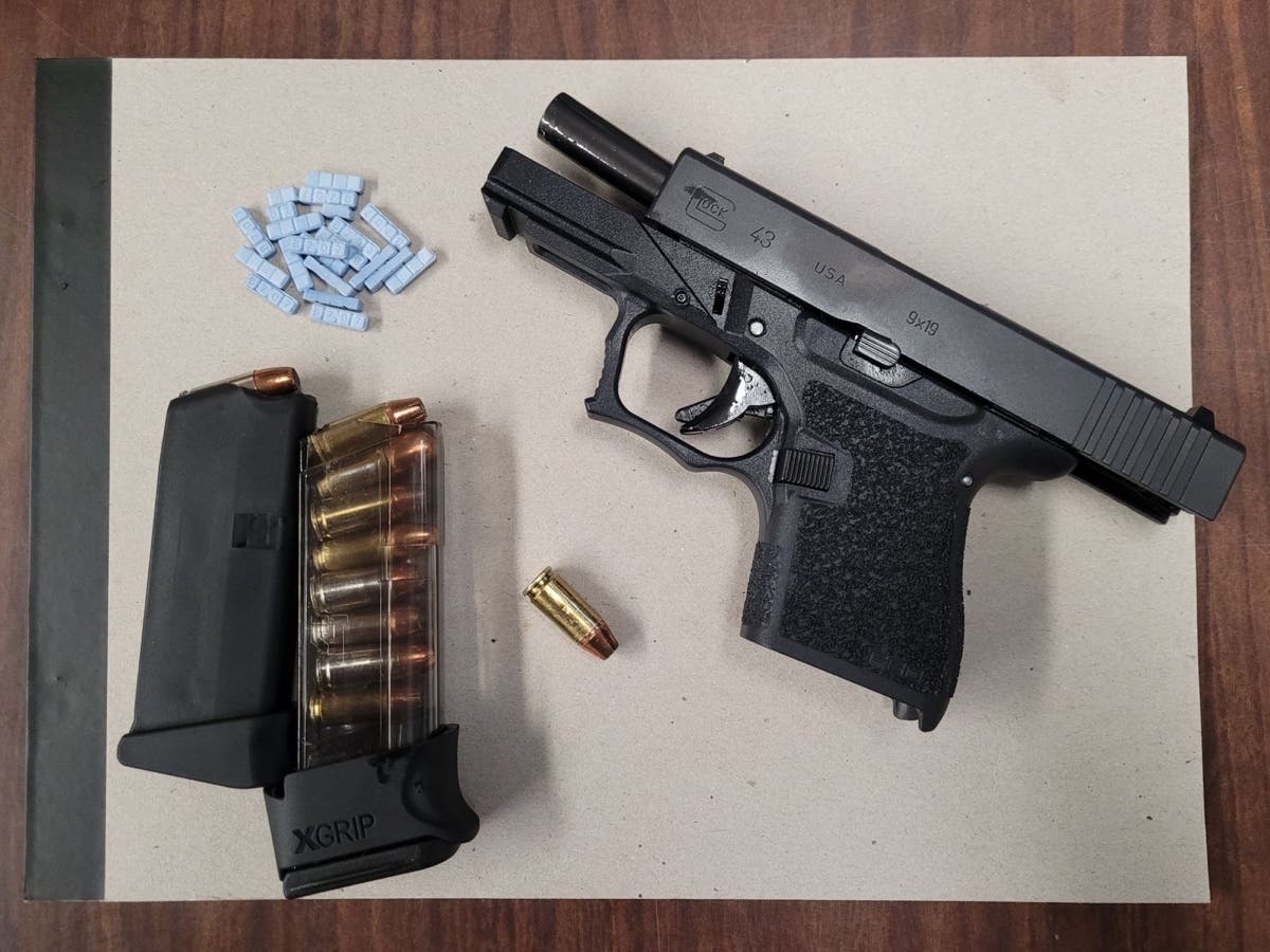A gun and pills seized by New York State Police. 