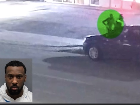 A dispute at the bar escalated to violence when police say McGougain​ fired several shots into the vestibule of the building, striking two employees. ​