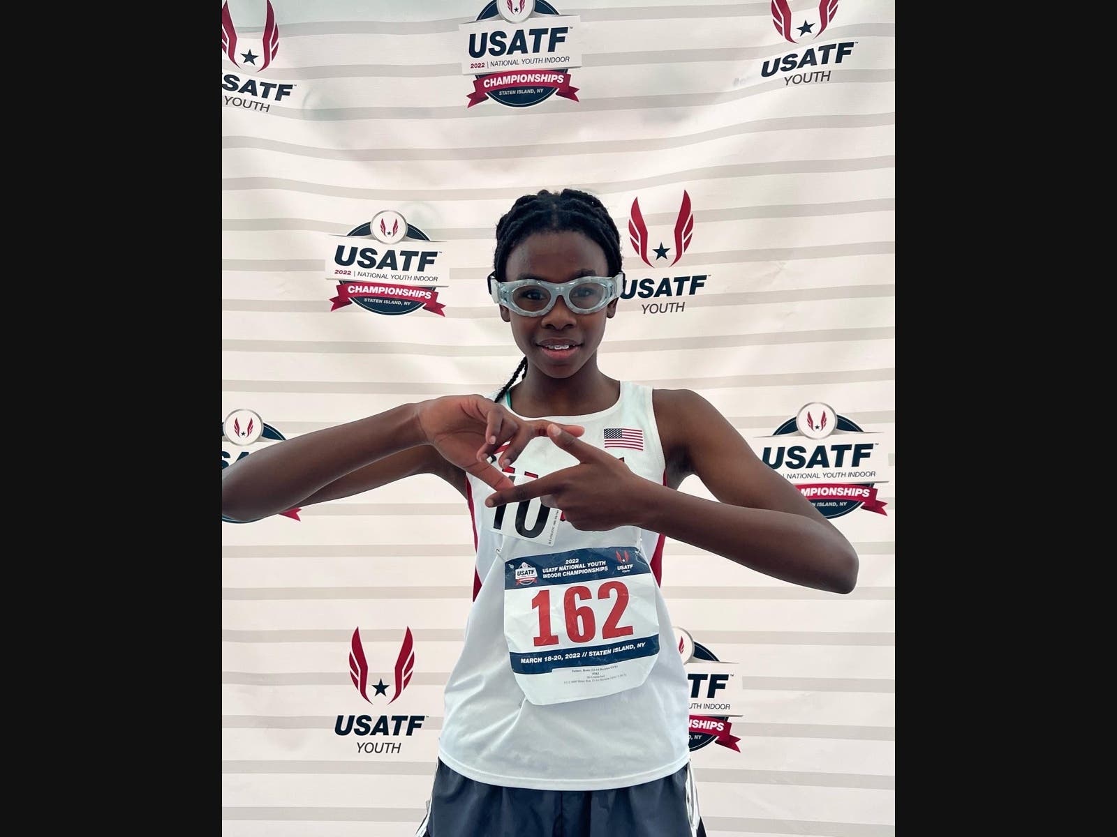 New Rochelle's Rosie Palmer shows the face of determination and joy at this weekend's USATF Youth Nationals. (Jonathan Palmer)