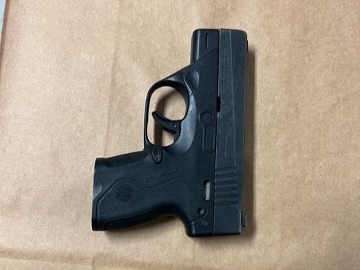 Police seized this loaded 9mm semi-automatic handgun on Wednesday. 