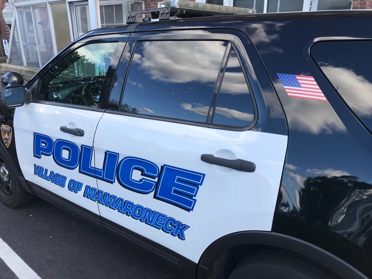 An approximately 6-inch-long fishing knife wrapped in a bandana was found discarded under a parked car, according to officials. 