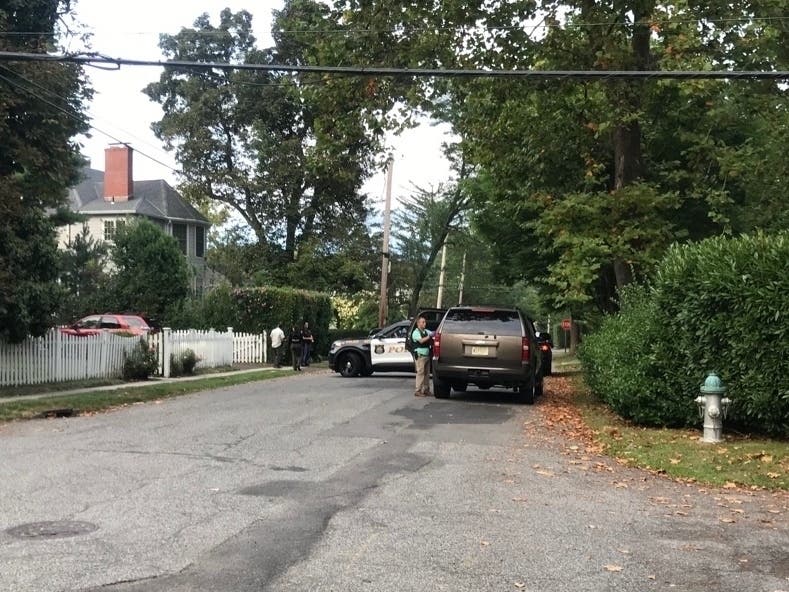 A large contingent of Larchmont police, Westchester County police and unmarked law enforcement vehicles converged on the scene at a house on the corner of Walnut Avenue and Circle Avenue in the village.