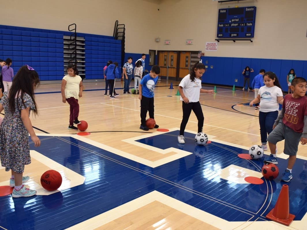 John F. Kennedy Elementary School fourth graders practiced their soccer skills in their physical education classes. 