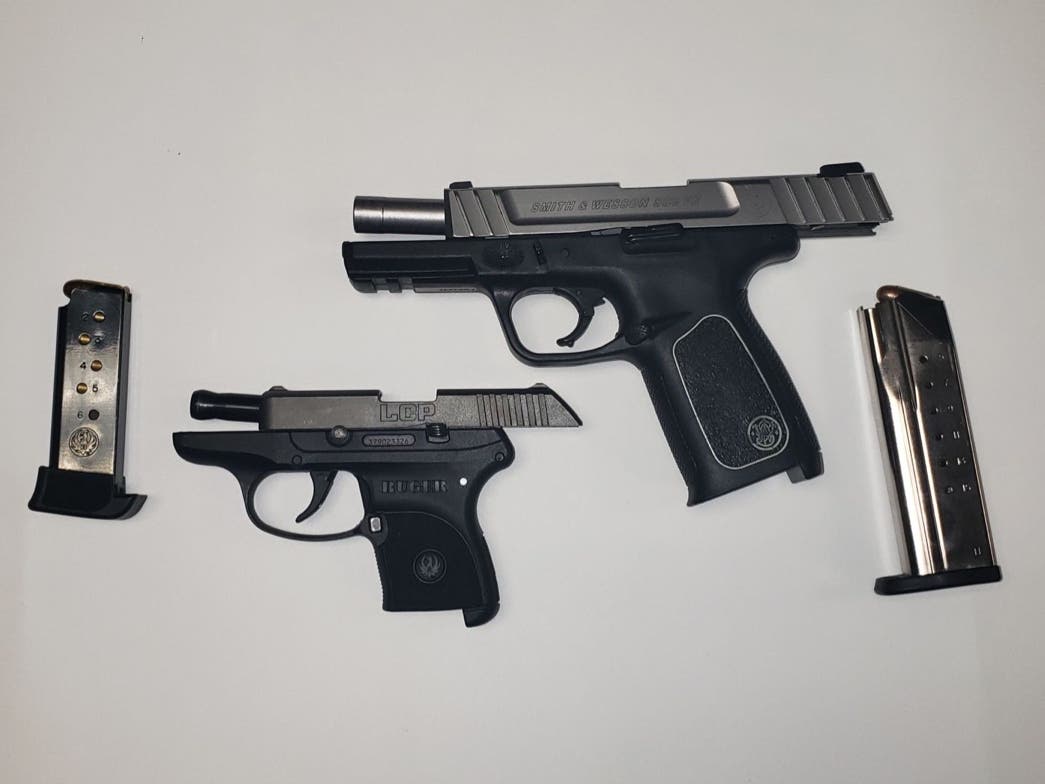 Troopers seized two handguns. 