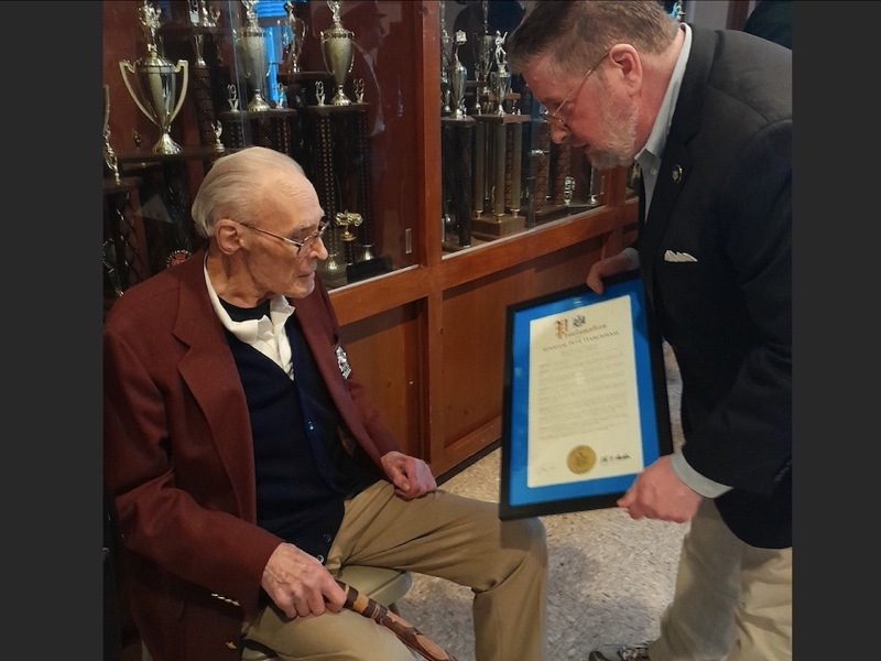 Sen. Pete Harckham awarding a Senate Proclamation to South Salem firefighter Waldie Gullen.