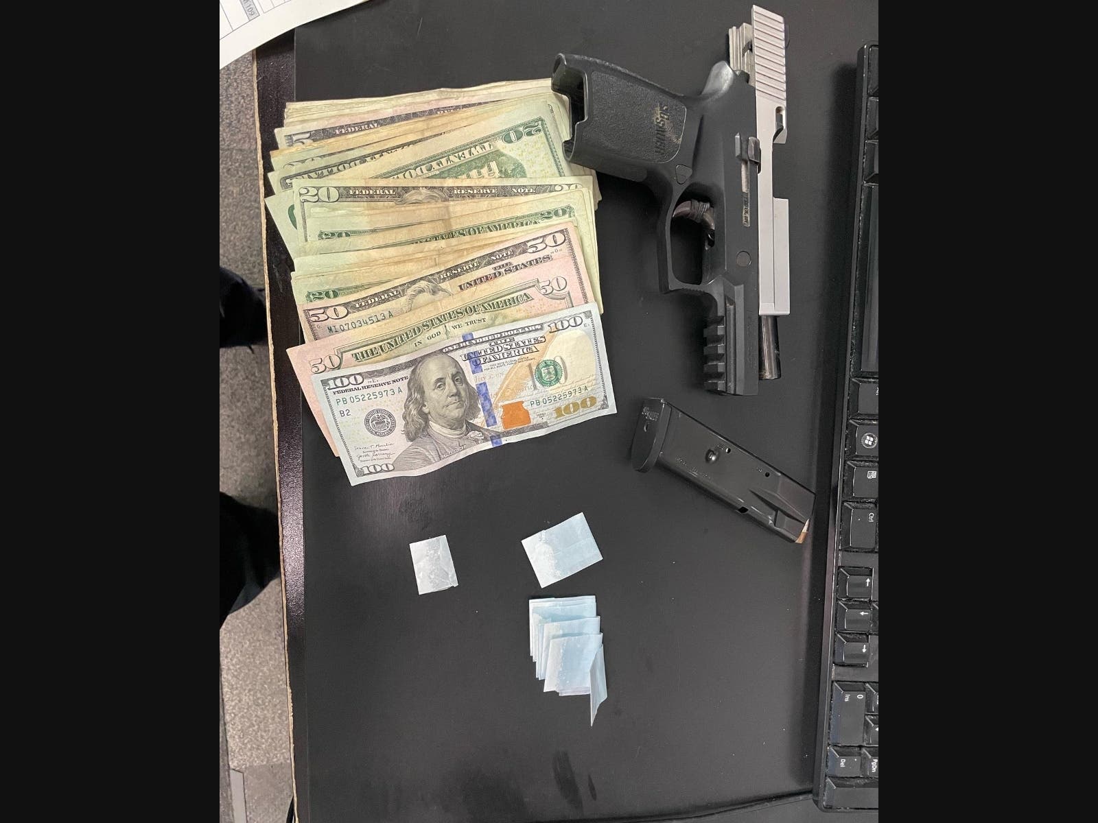 Thanks to a little help from Ike, police say they recovered a loaded .40 caliber semi-automatic handgun and several individually packaged envelopes of drugs.  