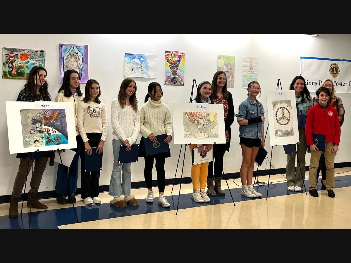 Legislator Catherine Parker with the winners, runners up & teachers.