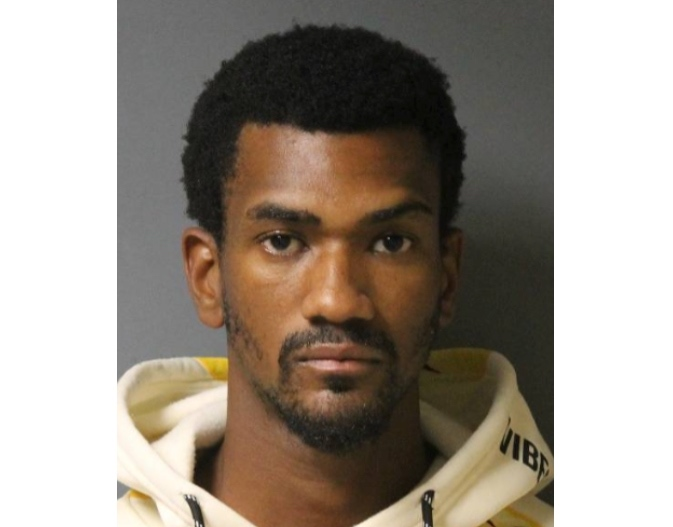Enoch Lowe, 25, also acted as lookout, letting the killer know when the man was outside alone, prosecutors said.
