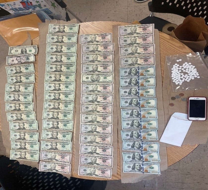 Law enforcement officers seized around $2,466 in cash.
