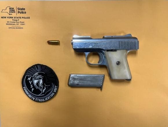 A search of the vehicle led to the recovery of this loaded semi-automatic handgun, state police said.