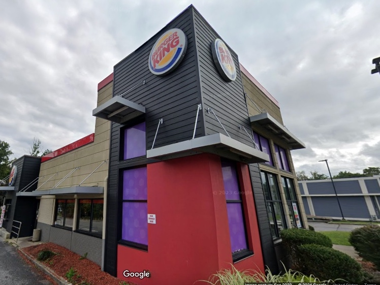 He assaulted a Burger King employee, stole the employee's phone along with cash from the register, according to police.