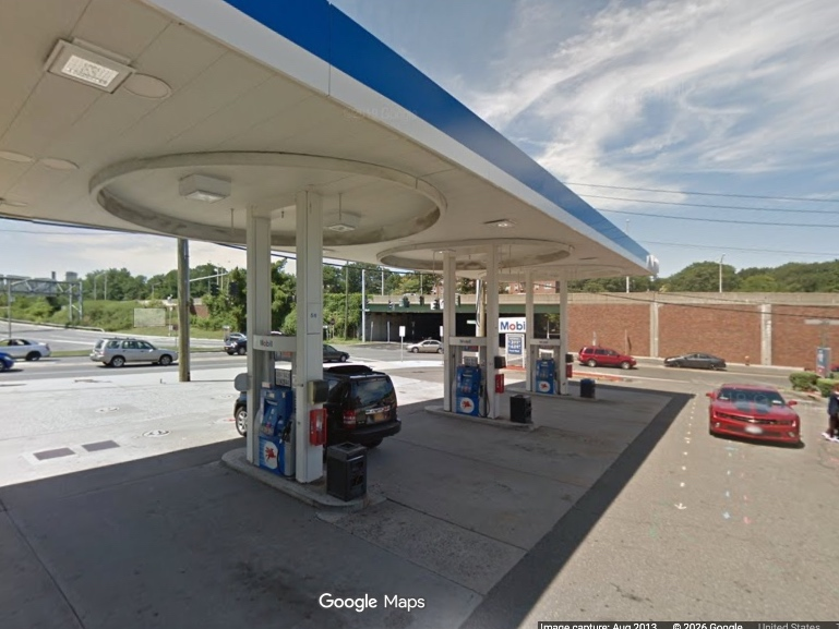 The suspect accelerated the vehicle toward the back of the gas station, driving through a shed and fence, before stopping in the parking lot of an apartment building next door, on Midland Avenue, according to YPD.