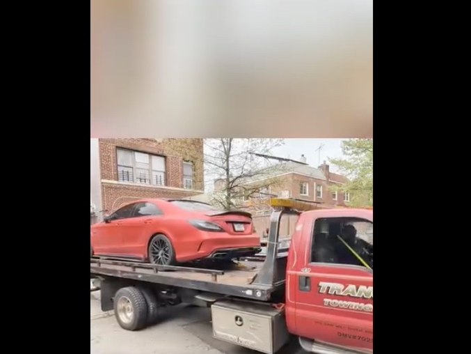 A "beamer" on the way to impound.