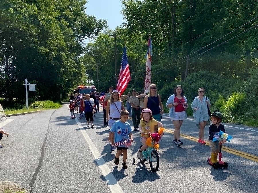 Children decorated their bicycles and scooters in patriotic and festive colors, and some even walked, n the parade at previous years' Memorial Day observance hosted by the Golden’s Bridge Fire Department, which culminated in a ceremony at the firehouse.