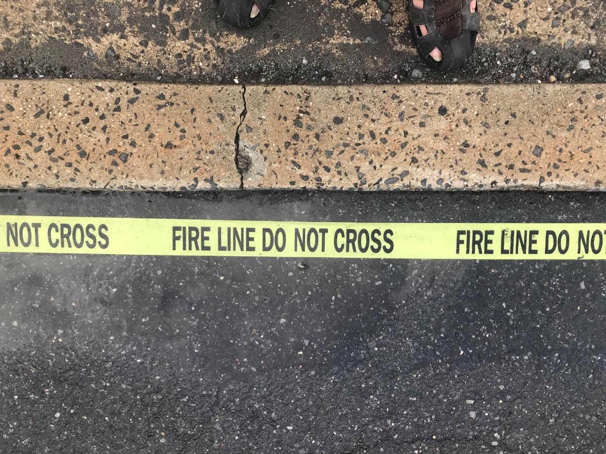 Two adults, a boy, and a girl were pulled from a second-floor bedroom of the home.