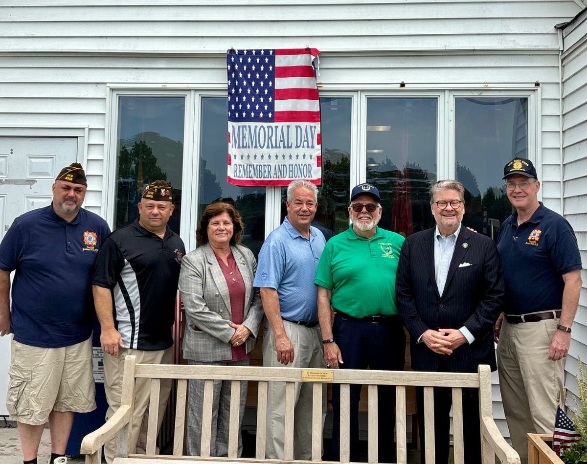 NYS Sen. Pete Harckham, VFW Post 8328 Member Diego Ortiz, Post Commander Alex Mandara, Yorktown Clerk Diana Quast, Yorktown Supervisor Ed Lachterman, Yorktown Councilmember Ilan Gilbert, PH, Post Chaplain Michael Sheridan.