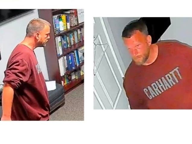 The suspect is described as a white man with short brown hair, a beard, and a tattoo on the right side of his neck.