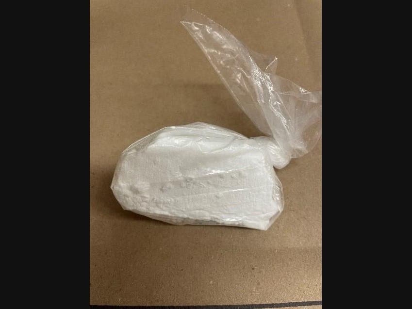 The investigation recovered more than one kilo of cocaine with an approximate street value of $30,000 and over $12,500 cash in proceeds from illicit narcotics sales, according to the AG.