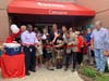 Bridgeport Mayor Joe Ganim and Hall Executive Director Robert Dzurenda cut the ceremonial ribbon with the help of children served by Hall