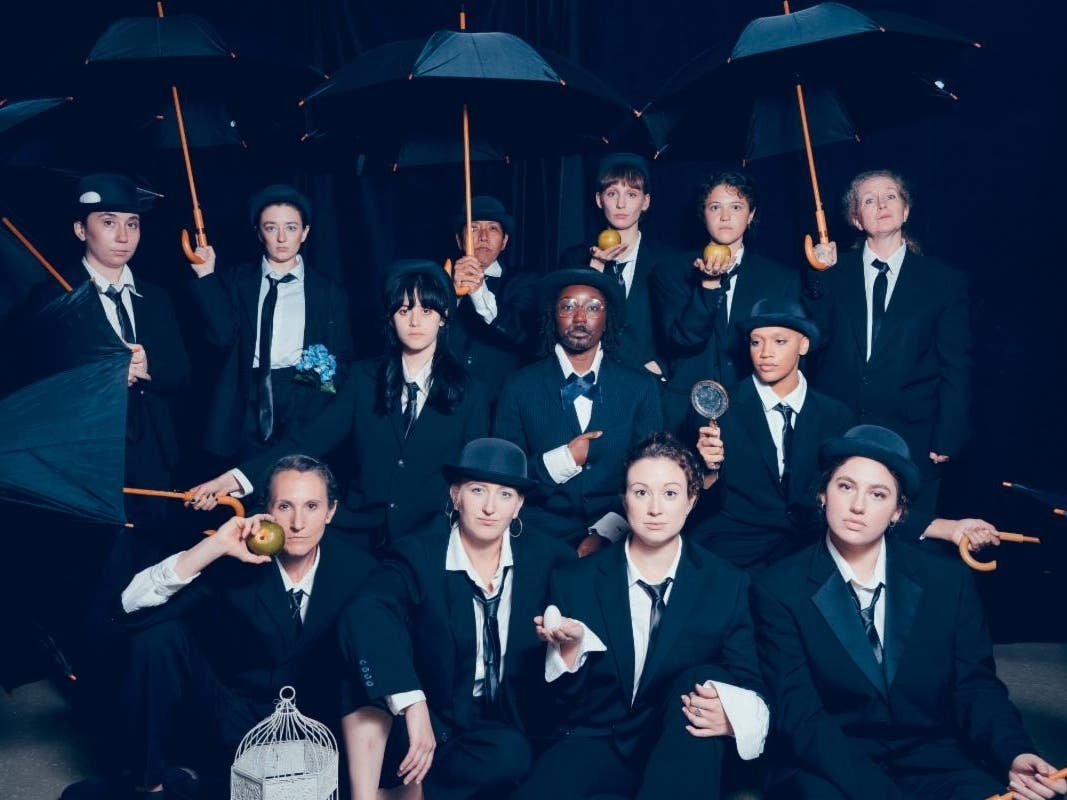 From left to right: Angel Page Smigielski, Julie Peterson, Courtney Reid Harris, Kristen Secrist, Lila Rubin, Emma Parssi, Morgan Van Dyne, Mia Hilt, Wannapa P-Eubanks, Jenise Sheppard as Freud, Mary Iris Loncto, Keila Hamed-Ramos and Laura Sturm.