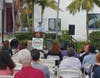 Mike Sonksen sharing his poem 'Ode to Oceanside: A Celebration of the Destination' at the 2021 Oceanside Tourism Summit