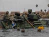 U.S. Marines with Co. A, 1st Battalion, 5th Marine Regiment, 1st Marine Division (1st MARDIV) and Co. B, 3d Assault Amphibian Battalion, 1st MARDIV, conduct rough water drills during AAV-P7/A1 amphibious assault vehicle training.