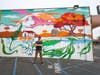 Broken Shed Vodka mural on the side of Harbor Liquor Store in Oceanside features themes and scenes of the striking natural landscape of Wanaka, New Zealand.