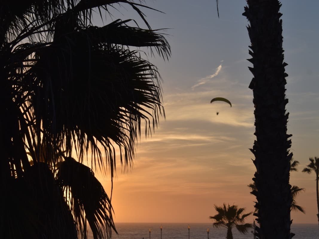 Parasailing Over The Pier