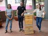 Alveole Team Manager Michelle Winter, Urban Beekeeper Rock Deliquanti, and City Center Fort Worth Director of Marketing Valerie Farrell welcome Queen Beeyoncé