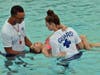 Admission for the World's Largest Swimming Lesson is free. Guests can stay in the park for the day with a reduced-price admission ticket $17.99 for children under 48 inches tall; $19.99 for 48 inches and taller, available at the Front Gate.