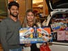 Karim Virani and Armeen Ali bring toys for Grace Christmas Cottage
