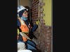 Lucia Trujillo is learning bricklaying on the job at DBI in Dallas
