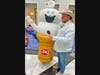 Josh Abbott enjoys a DQ DILLY Bar with DQ mascot Curly