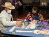 Country Music star Josh Abbott creates crafts in the Child Life Zone at Cook Children’s