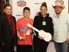 Texas Dairy Queen Operators’ Council CEO Lou Romanus and Josh Abbott with a couple of Cook Children’s patients