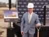 Patrick Huston, General Manager of Park Place Porsche, celebrates the groundbreaking of the new dealership. 