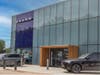 The redesigned facility features a striking glass exterior, Volvo’s signature blue accent panels.