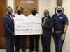 L to R: Assistant Police Commissioner Mario M. Brooks, St. Thomas / Water Island Chief of Police Richard Velazquez, Jason Charles, Community Outreach Director at Southland Gaming, Police Commissioner Trevor A. Velinor, and Shaine Gaspard, CEO of Southland
