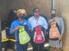 The team coordinating the bookbag give-away. 