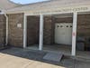 Vandalism on March 29 or 30, 2022. The graffiti still remains on May 2, 2022.  The red paint on the pillars seems to read "guns."