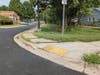 A yellow ramp would allow a student in a wheel chair to navigate to the sidewalk adjacent to the garden, then reach over and pick a mint leaf, a tomato, or plant a seed. Children could attend a lesson outdoors, from the sidewalk, meeting ADA requirements.