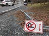 Signs get knocked down within a few days of being replaced. Perhaps a study can be (is being?) done re. the traffic and landscaping. Strawberry Knoll Rd. Emory Grove Rd intersection is in the distance. Behind the camera (not in image) is a steep hill. 