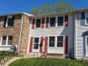 (A) For more than a year, there were no house numbers over the front door as required by the Quail Valley HOA and the MoCo fire marshal.  Photo 4/16/2023. An HOA board member owns this property. 