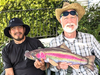 (L to R) Eric Segura, Steve Lapham, and Nuggets the rainbow trout swim-tote bag, who is delighted when more community members are invited into the pool where they can splash around like fish in a stream.  