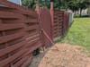 Apparently, this is the look that the HOA likes in a fence? The homeowner asks permission to replace & upgrade the back section after removing a bothersome tree (see sawdust).  They wait, & wait, and finally receive a letter with errors: "Obtain a plat."