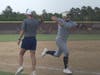 Lake Creek sophomore Ava Brown (right) celebrates with head coach Michelle Rochinski as she rounds third base after hitting a home run in the fifth inning of a Class 5A Region III quarterfinal against Magnolia West on Friday. Lake Creek won 16-0.