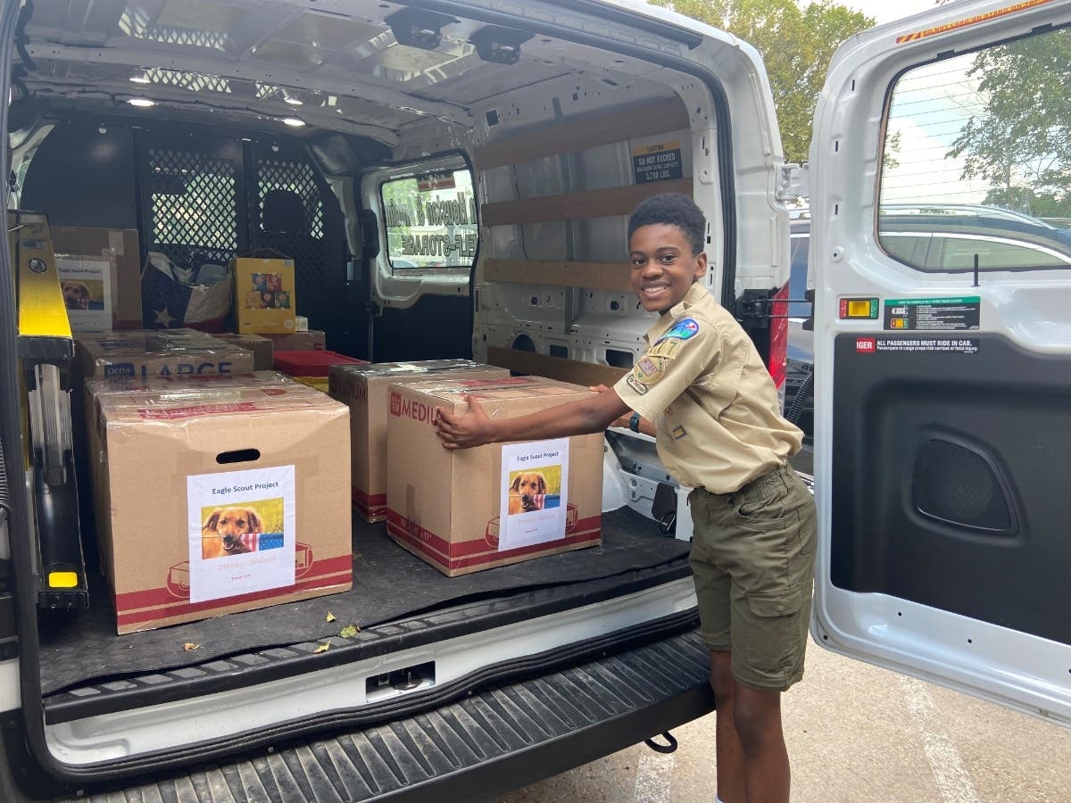 Brandon Wallace recently completed his Eagle Scout project benefitting Meals on Wheels Montgomery County. Wallace donated 2,000 pounds of dog food for senior pet owners who struggle to pay for food and installed a flag pole near the entrance.