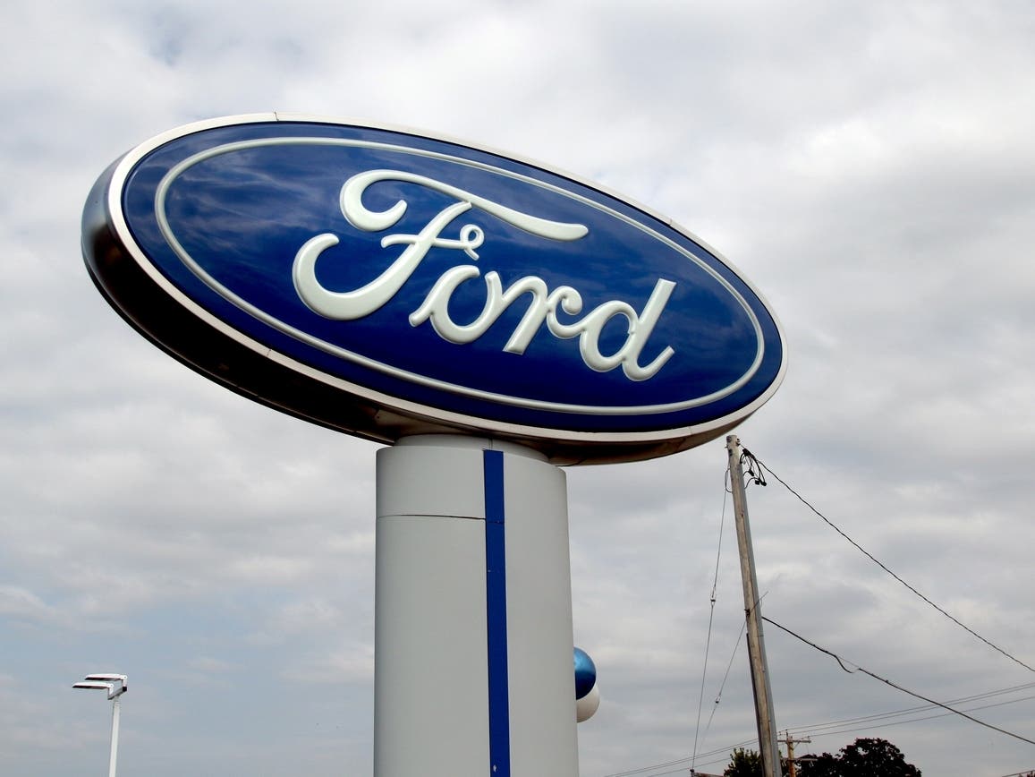 Ford Motor Co. is looking at reorganizing in an attempt to challenge Tesla's dominance in the electric vehicle market with plans to spend up to $20 billion, according to a report from Bloomberg.