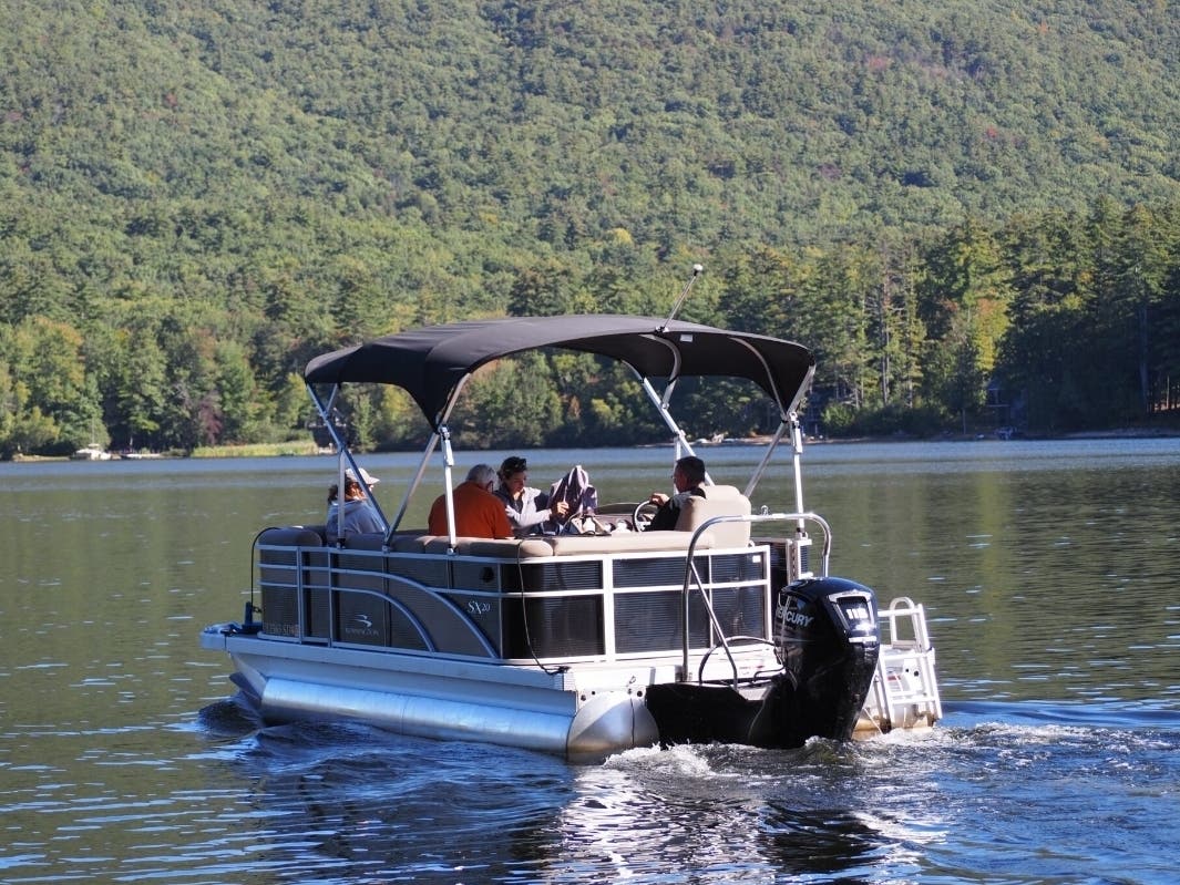 A team of researchers with the UNH Lakes Lay Monitoring Program heads out to track water quality on Lake Kanasatka in Moultonborough Thursday, Sept. 24. 