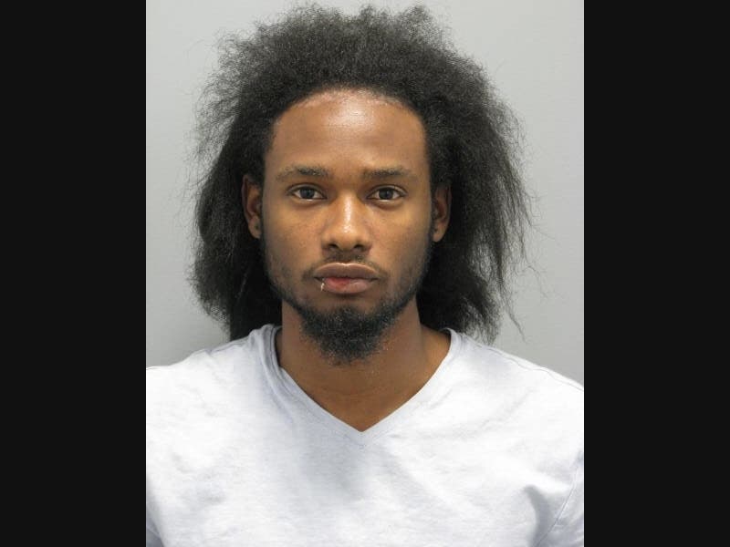 Dwayne Gordon is accused of headbutting an officer and attempting to flee during a stop in Lawrence, Nassau police said. 